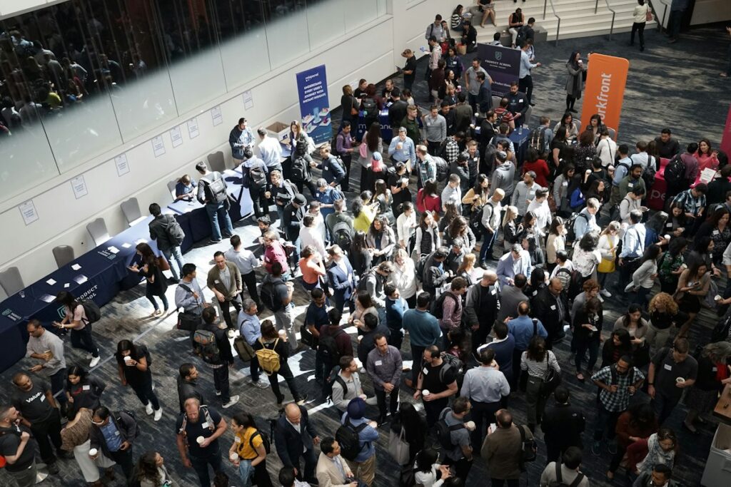 Conference attendees at event registration desks – device rental for events in Dubai